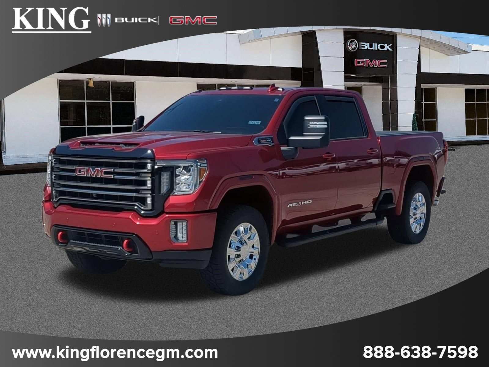 2020 GMC Sierra 2500 HD AT4 in Red Quartz Tintcoat — front three-quarter view